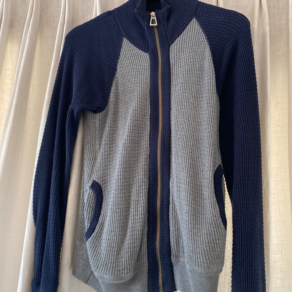 Zip up grey and navy sweater